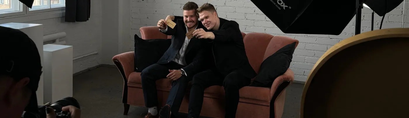 Topias and Severi Saari on the sofa at the VSCY studio on a shoot day